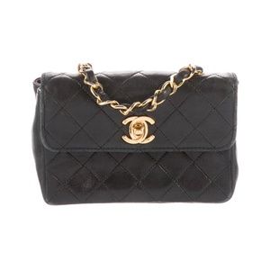 CHANEL BLACK LAMBSKIN MINI QUILTED FLAP BAG (CIRCA 1990)